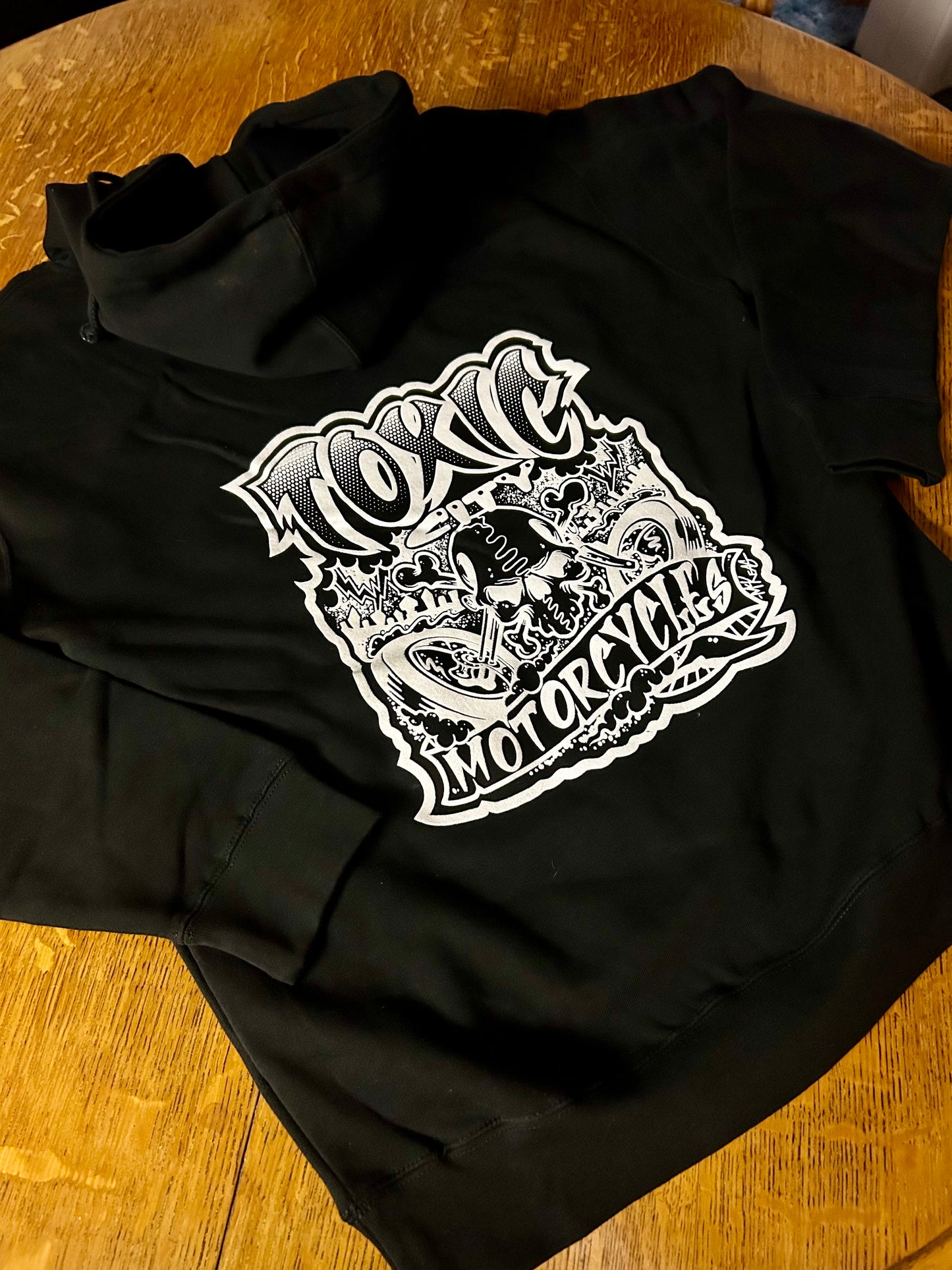 A Limited Edition Hoodie! “Toxic City Motorcycles" McKeag Art Designed hoodie Exclusively from ToxicOG Streetwear!