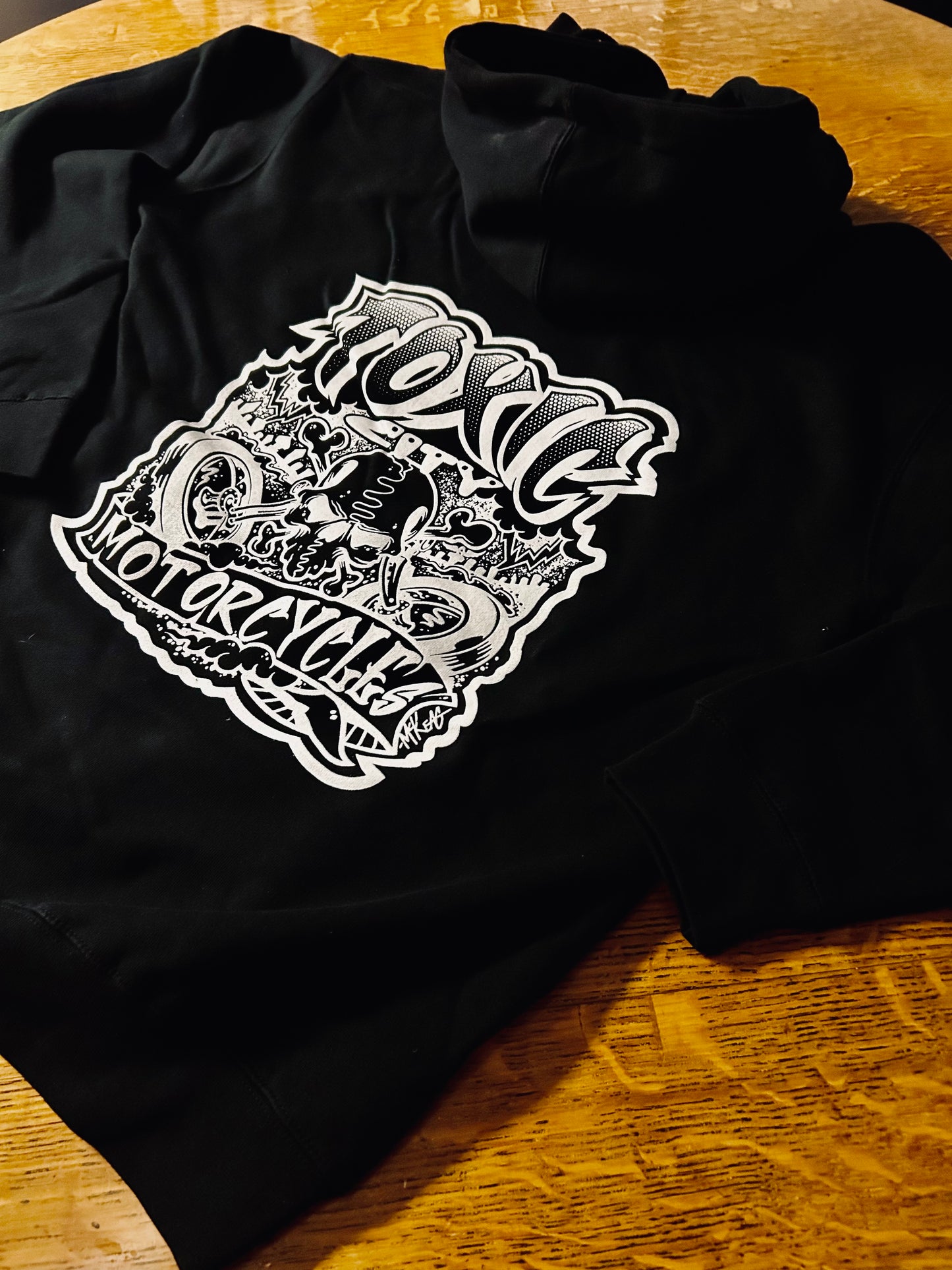 A Limited Edition Hoodie! “Toxic City Motorcycles" McKeag Art Designed hoodie Exclusively from ToxicOG Streetwear!