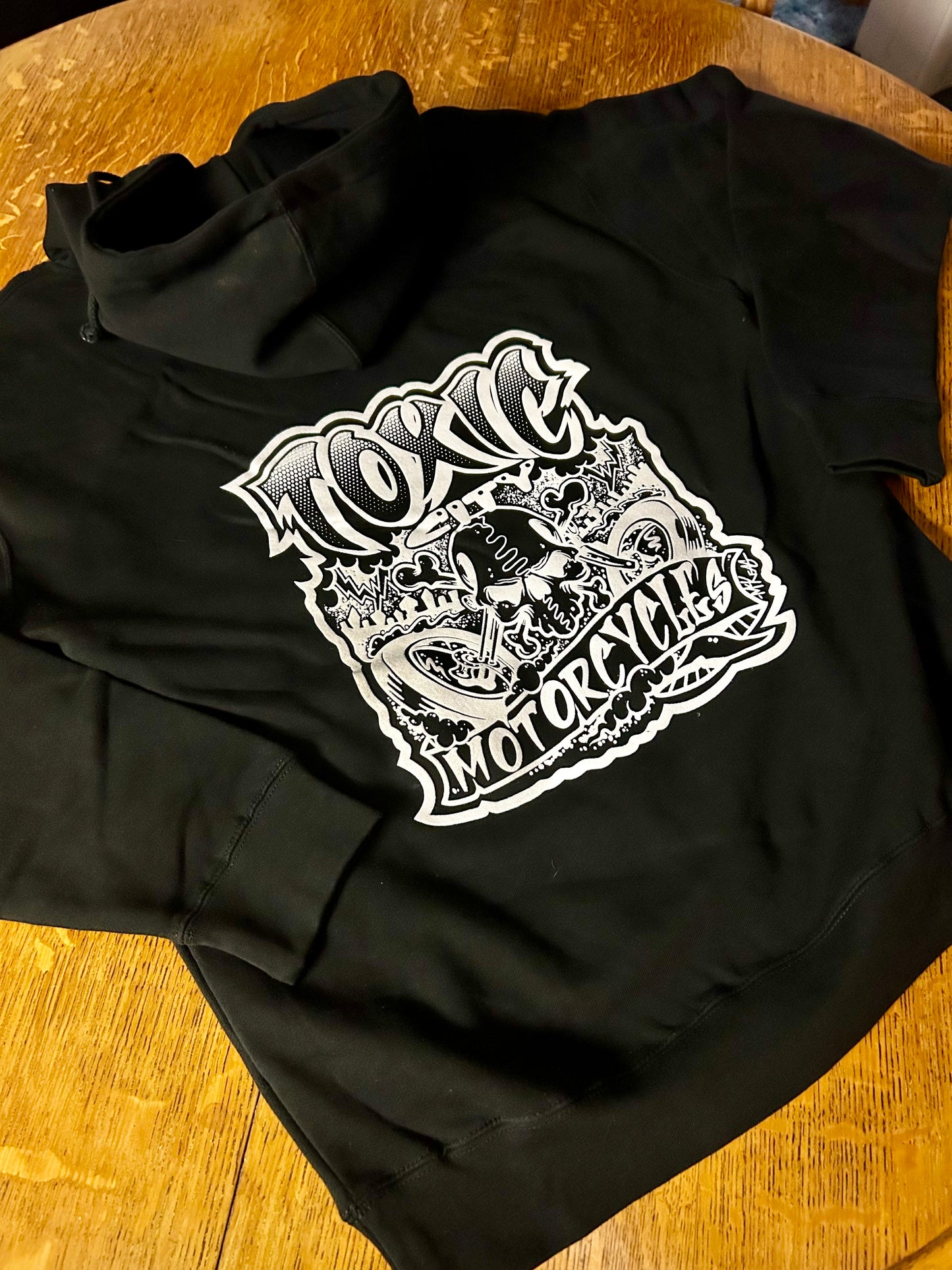 A Limited Edition Hoodie! “Toxic City Motorcycles" McKeag Art Designed hoodie Exclusively from ToxicOG Streetwear!